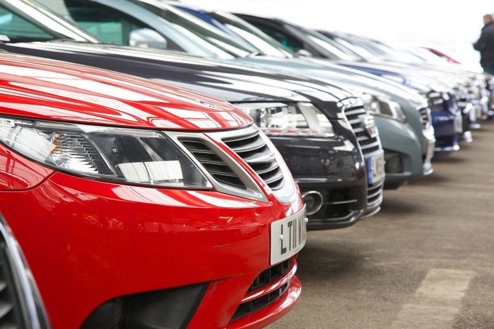 A line-up of older used cars