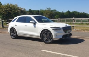 An image of the Genesis Electrified GV70 parked on the roadside
