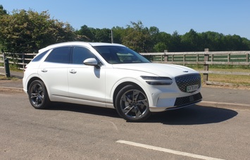An image of the Genesis Electrified GV70 parked on the roadside