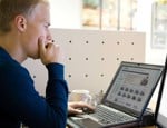 Man assessing insurance costs
