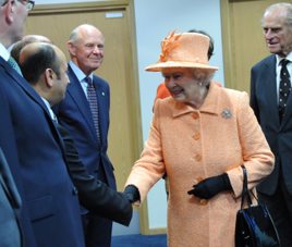 Former Marshall Motor Group chief executive Daksh Gupta meets Queen Elizabeth II