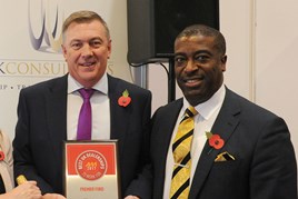 David Rye, managing director, Premier Ford, left, accepts the AM Best UK Dealerships  to Work For award from LTK Consultants’  managing director, Andrew Landell