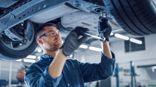 A technician working on a car