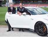 Paul Jordan, aftersales manager from Macklin Motors Glasgow Nissan Central, with Alan Archibald, Partick Thistle manager