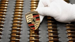 Porsche reports sharp drop in profits as it accelerates strategic overhaul