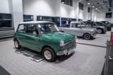Line-up of classic Minis at Dick Lovetts BMW/Mini dealership opening in Melksham