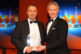 John Luck, general manager, Yeomans Toyota Brighton, collects the award from Mark Gow, sales director, DSG Finance