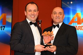 Guy Watson, head of business, Peter Vardy BMW & Mini Edinburgh (left), collects the AM Award 2017 for best sales team (new or used)  from Gary Lee, regional sales director  Barclays Partner Finance