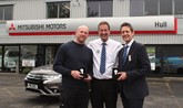 Hull Mitsubishi’s managing director Jim Clutterbrook congratulates Andrew Roebuck (left) and Andrew Iveson
