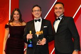 Ashley Andrew, managing director, Hyundai Motor  UK, accepts the award from Hasan Nergiz, head  of OEM and agency strategy, Carwow, right, and host Lisa Snowdon