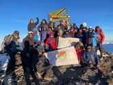 Ben ILC 2022 team members at the summit of Mount Kilimanjaro