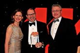 Former Benfield Motor Group chief executive Mark Squires, centre, accepts his award from host Katie Derham and Jonathan Ellis, UK sales manager lubricants, Shell Oil