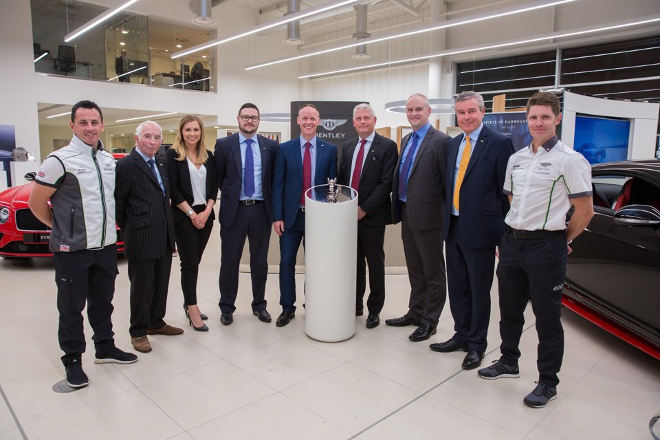 Michael Carr (fourth right), with members of the Bentley Leeds team joined by Bentley GT3-R racing drivers Guy Smith and Steven Kane at the dealership’s Nurburgring simulator event