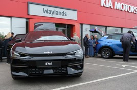 A Kia Stinger EV outside Waylands Automotive's new Bicester dealership 