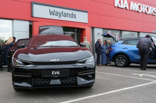 A Kia Stinger EV outside Waylands Automotive's new Bicester dealership 