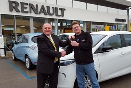Customer David Wallace receives his new Renault ZOE from Brayleys’ Graham Glover.