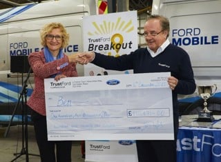 Breakout for Ben: Ben chief executive, Zara Ross, accepts the cheque from TrustFord chairman and chief executive, Stuart Foulds