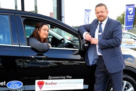 Gemma Lowery with Shaun Steed, new and used car sales manager at Bristol Street Motors Hartlepool Ford