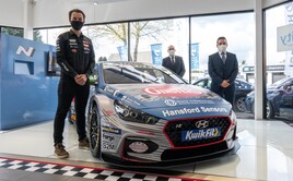 BTCC racer Tom Ingram with Bristol Street Motors Hyundai Nottingham sales manager Justin Iliffe and general manager James Orridge