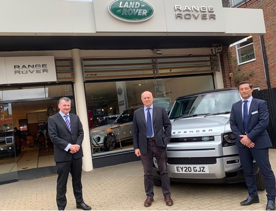 Cambria Automobiles CEO Mark Lavery with Sir Iain Duncan Smith, the MP for Chingford and Woodford Green and Grange Woodford head of business Paul Greenberg