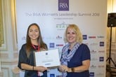 Caroline Hazlehurst receives her Leader of the Future award from Karen Myers, executive director of communications at The R&A