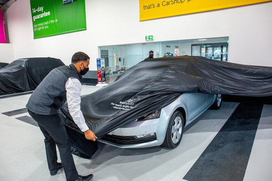 A car handover at Sytner Group's CarShop Express Store in Leicester