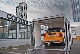 A Carzam car transporter containing a Mini Cooper S home delivery online sale