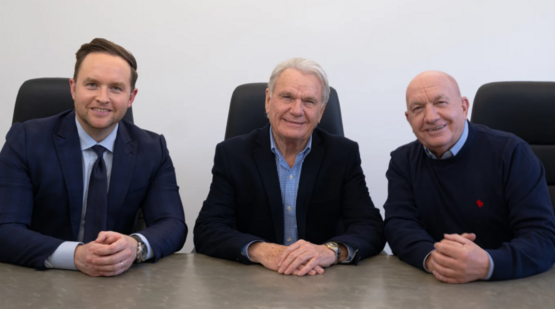 Chorley Group managing director Adam Turner (left) and chairman Andrew Turner (right) with  BCC Cars Group founder and chairman, Mike Holt