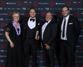 Winners: Chorley Group finance director Hilary Nicol; MD Adam Turner; and founder and chairman Andrew Turner with Mark Edwards, operations director for award sponsor Seriun