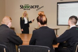 Stoneacre's group academy manager, Claire Perkins, with apprentices
