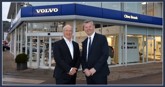 Clive Brook outside the Volvo Bradford car dealership with Ray Chapman Motors MD Duncan Chapman