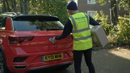A Hermes parcel delivery being carried out using Volkswagen's 'We Deliver' app