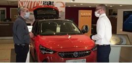 A social distanced car sales experience in masks