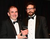 Bagot Road Garage group director, Craig Seager, receives the group's Gold Award from  Vincent Tourette, managing director Renault UK