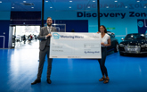 Adam Turton from Big Motoring World in Peterborough presented Danielle Mceachern, 30, a pediatric nurse with the first prize of a £1,000 fuel voucher. 