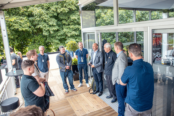 Sytner CEO Darren Edwards with Penske Automotive founder and chairman Roger Penske, Sytner’s director of human resources Mel Rogers and some Elite Technician Programme finalists