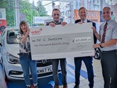 Eden Motor Group customer Gerald Swallow receives his £10,000 prize