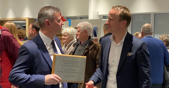 Volvo York dealer principal, Duncan Chapman, is presented with a commemorative plaque by Volvo Car UK managing director Kristian Elvefors (right)