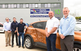 Fix Auto Cheltenham owners Andrew Emery (left), Kieran Humphries (third left) James Hodges with Mark Hutchins (right) and Neil Reader 