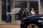 Customers in Genesis showroom