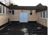 The partially renovated Bushey Heath scout headquarters