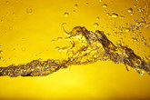 gasoline, water on yellow background, used car petrol