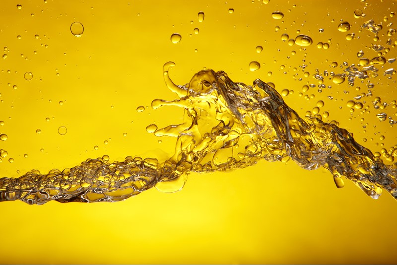 gasoline, water on yellow background, used car petrol