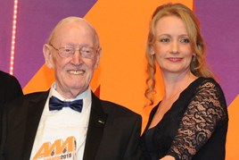 Jack Tordoff, chairman, JCT600  left, is inducted to the AM Hall of Fame, collecting the award  from Katie Rugen, UK automotive sales team lead, Shell UK