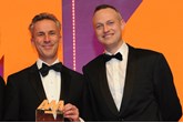 Jon Wakefield, managing  director, Volvo Car UK, collects the award from Andrew Hooks, chief operating officer, carwow, right