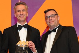 Jon Wakefield, managing director, Volvo Car UK, collects the award from Chris Benham, key account manager, Supagard, right