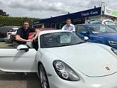 Think Cars' Kristian Robinson with Darren Cooper, managing director of the Peter Cooper Motor Group