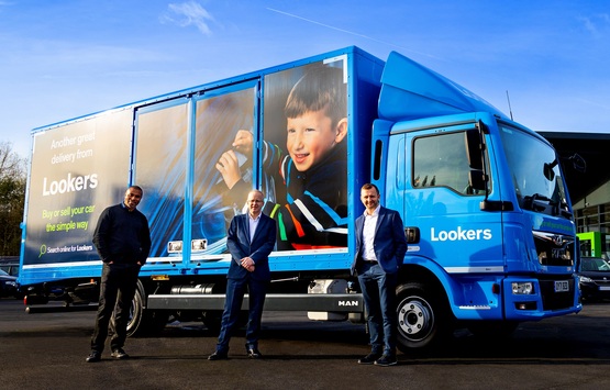 Lookers CEO Mark Raban and  COO Duncan McPhee with a new car delivery/collection lorry