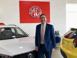 Minstergate chief executive, Mark Campey, celebrates his business' new MG dealerships' opening