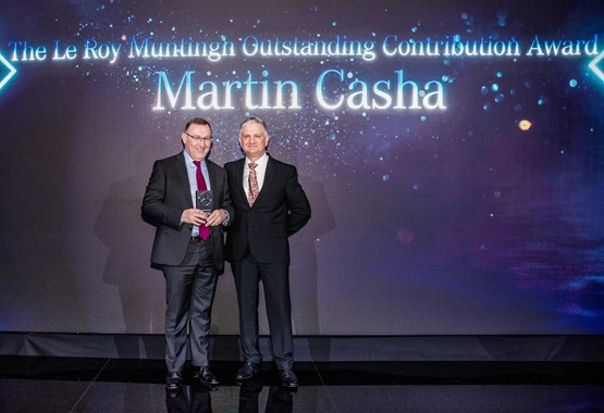 Pendragon chief operating officer, Martin Casha, receives the Le Roy Muntingh Outstanding Contribution Award